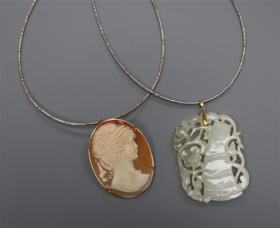 Two 925 sterling necklets, one with carved jadeite pendant and 14k bale and one with cameo pendant. jadeite 56mm.
